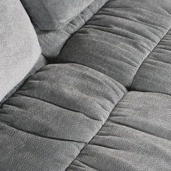 Sofa roulé et compressé dans une boite